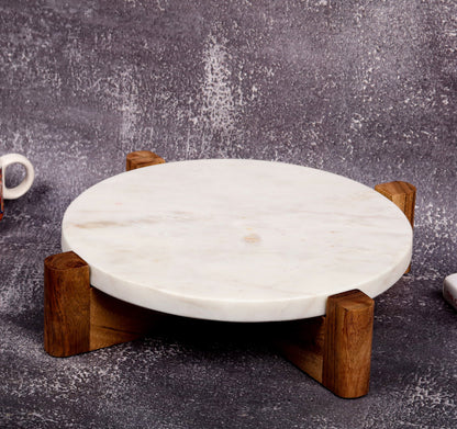 White marble cake stand with wooden base